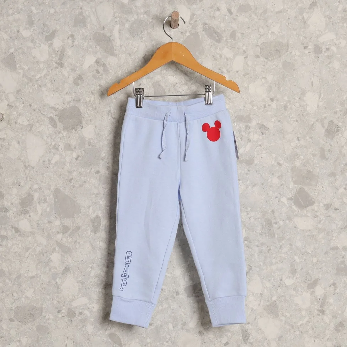 calça azul mickey gap
